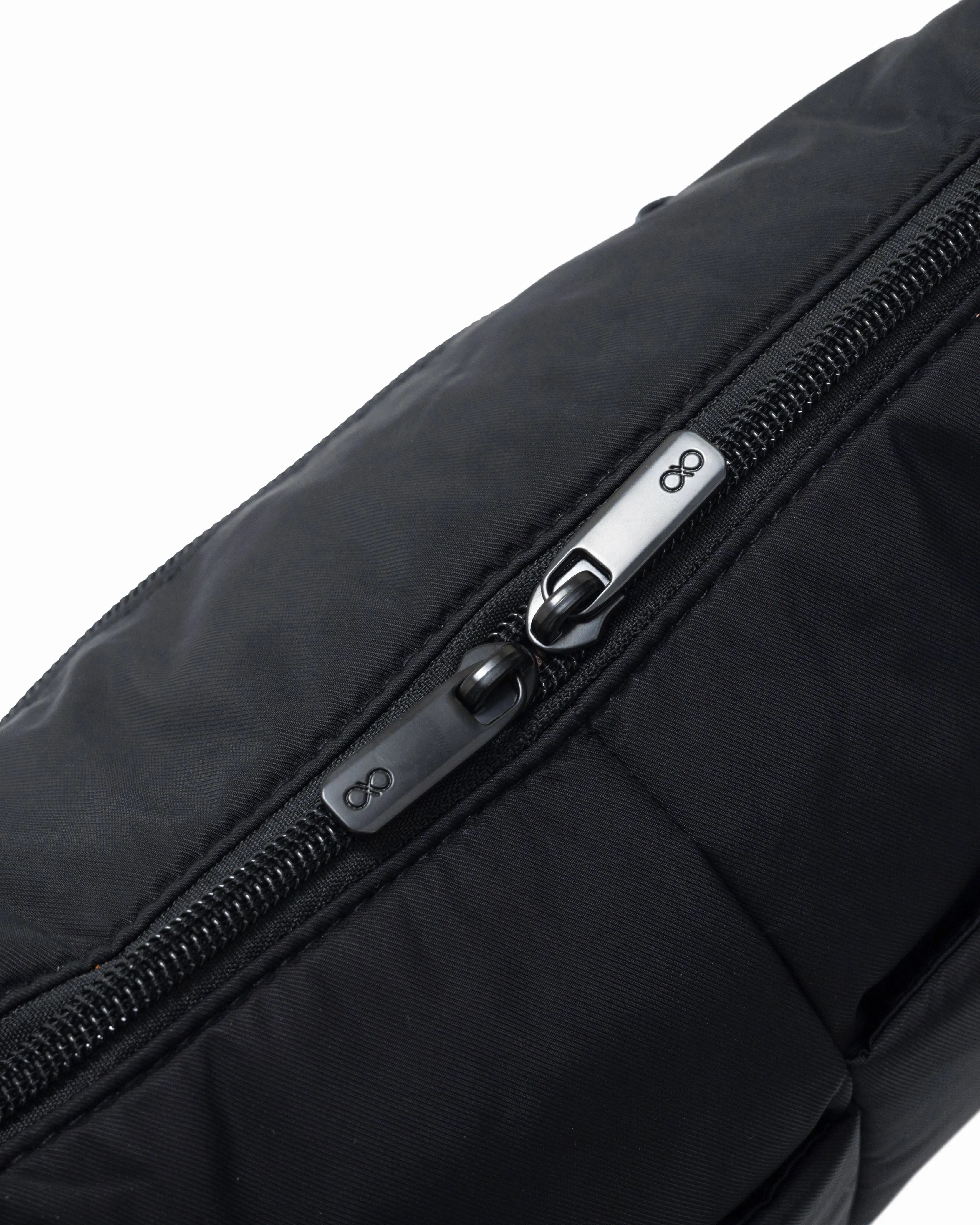 MINI SIGNATURE POCKET CROSSBODY BAG IN POSH JET BLACK