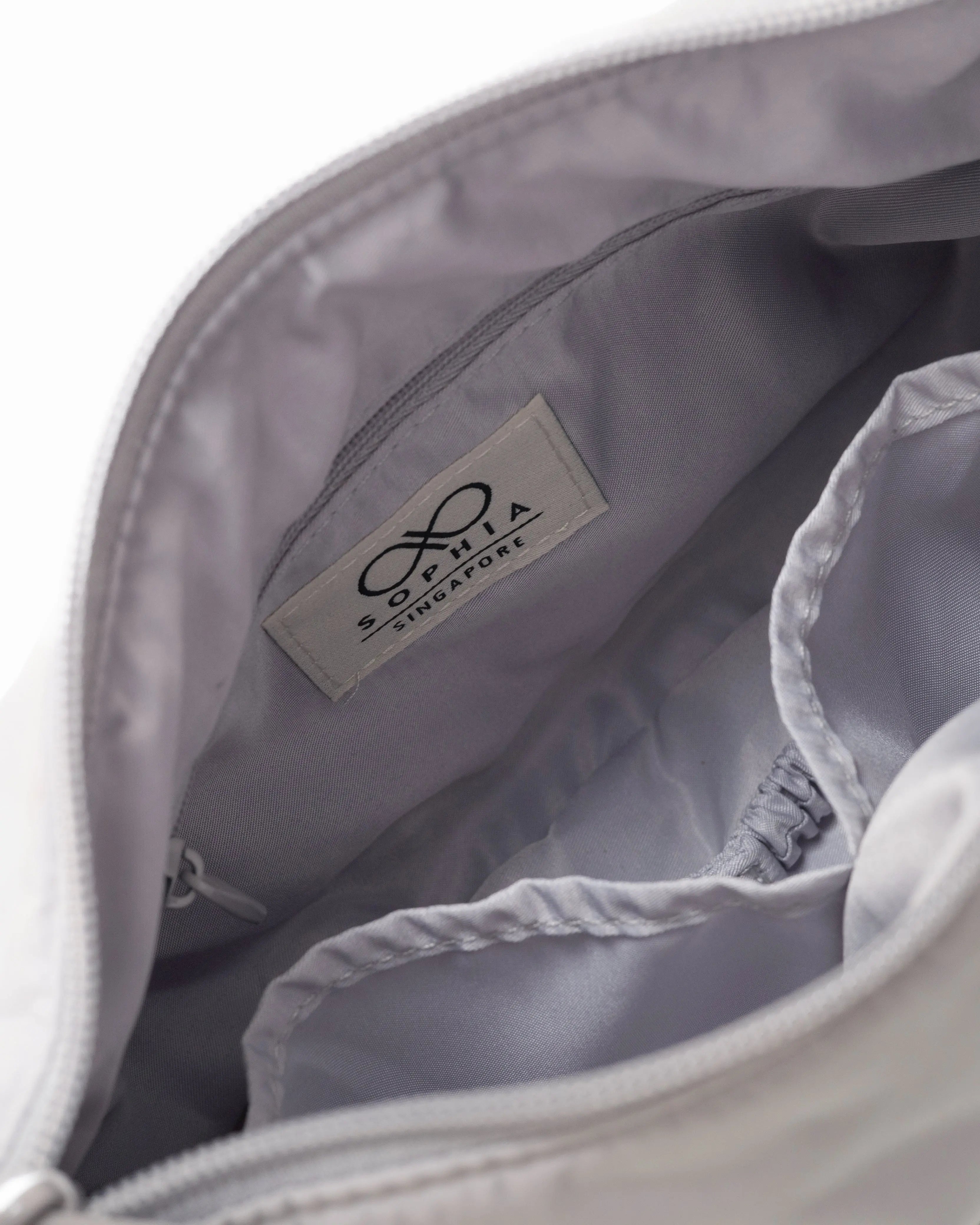 MINI SIGNATURE POCKET CROSSBODY BAG IN COSY LUXE DOVE GREY
