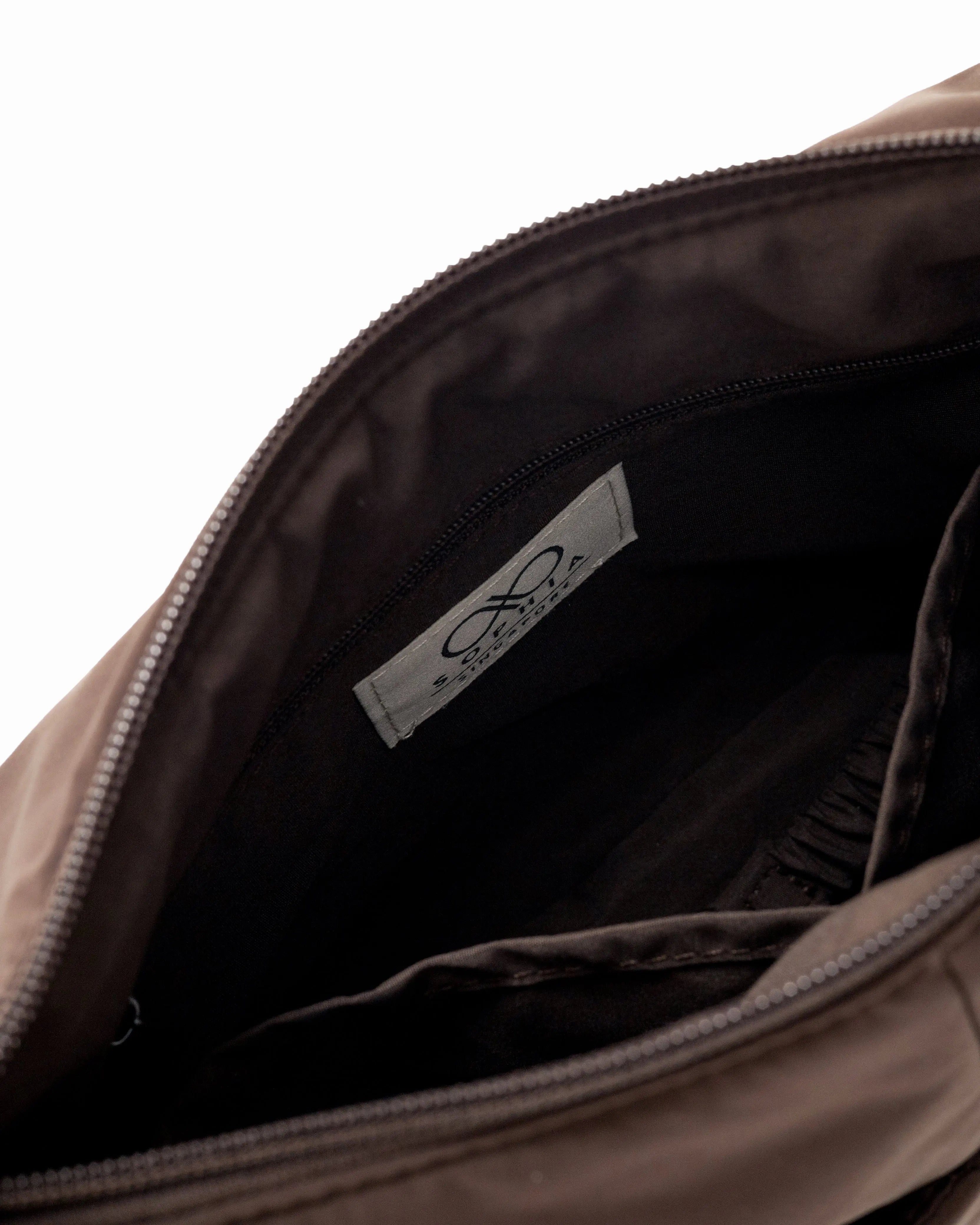 MINI SIGNATURE POCKET CROSSBODY BAG IN COSY LUXE CACAO