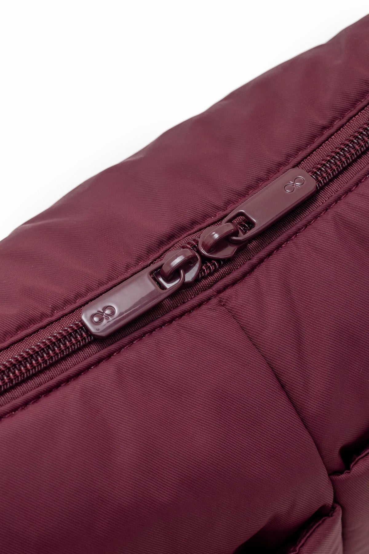 MINI SIGNATURE POCKET CROSSBODY BAG IN POSH WINE