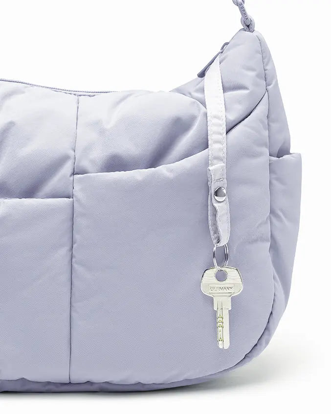 SIGNATURE POCKET CROSSBODY BAG IN COSY LUXE LILAC