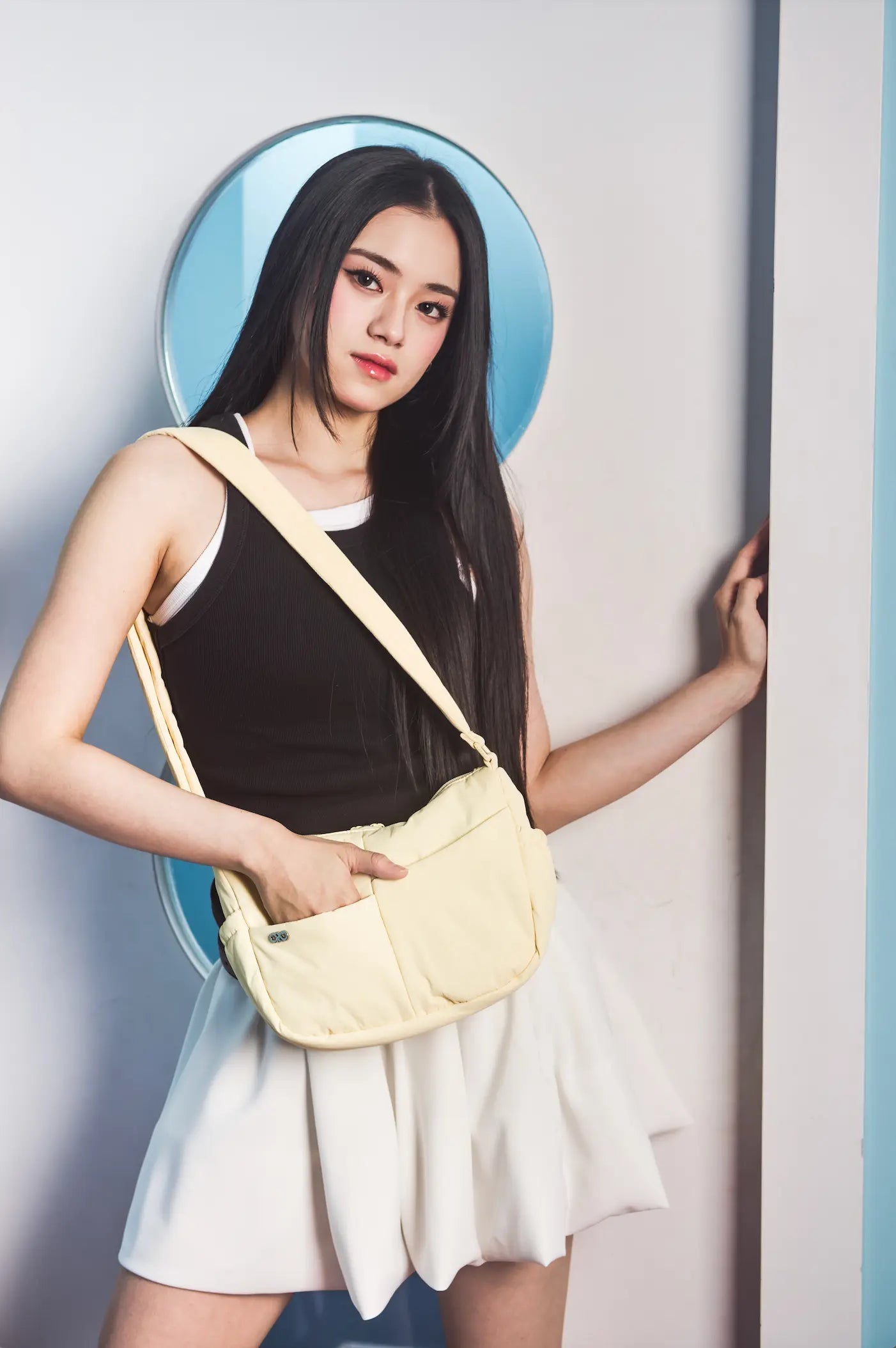 MINI SIGNATURE POCKET CROSSBODY BAG IN POSH MELLOW