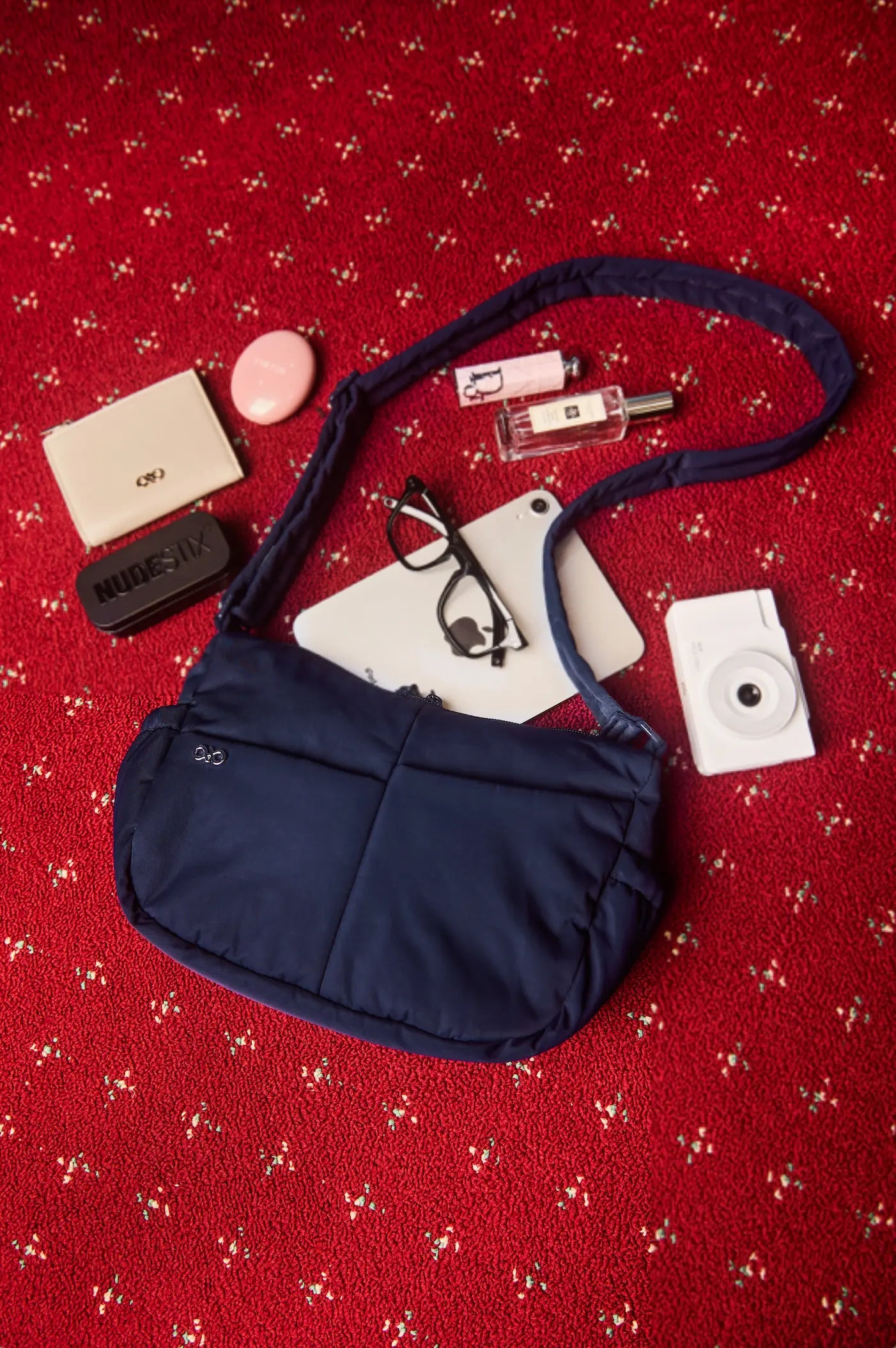MINI SIGNATURE POCKET CROSSBODY BAG IN POSH MIDNIGHT