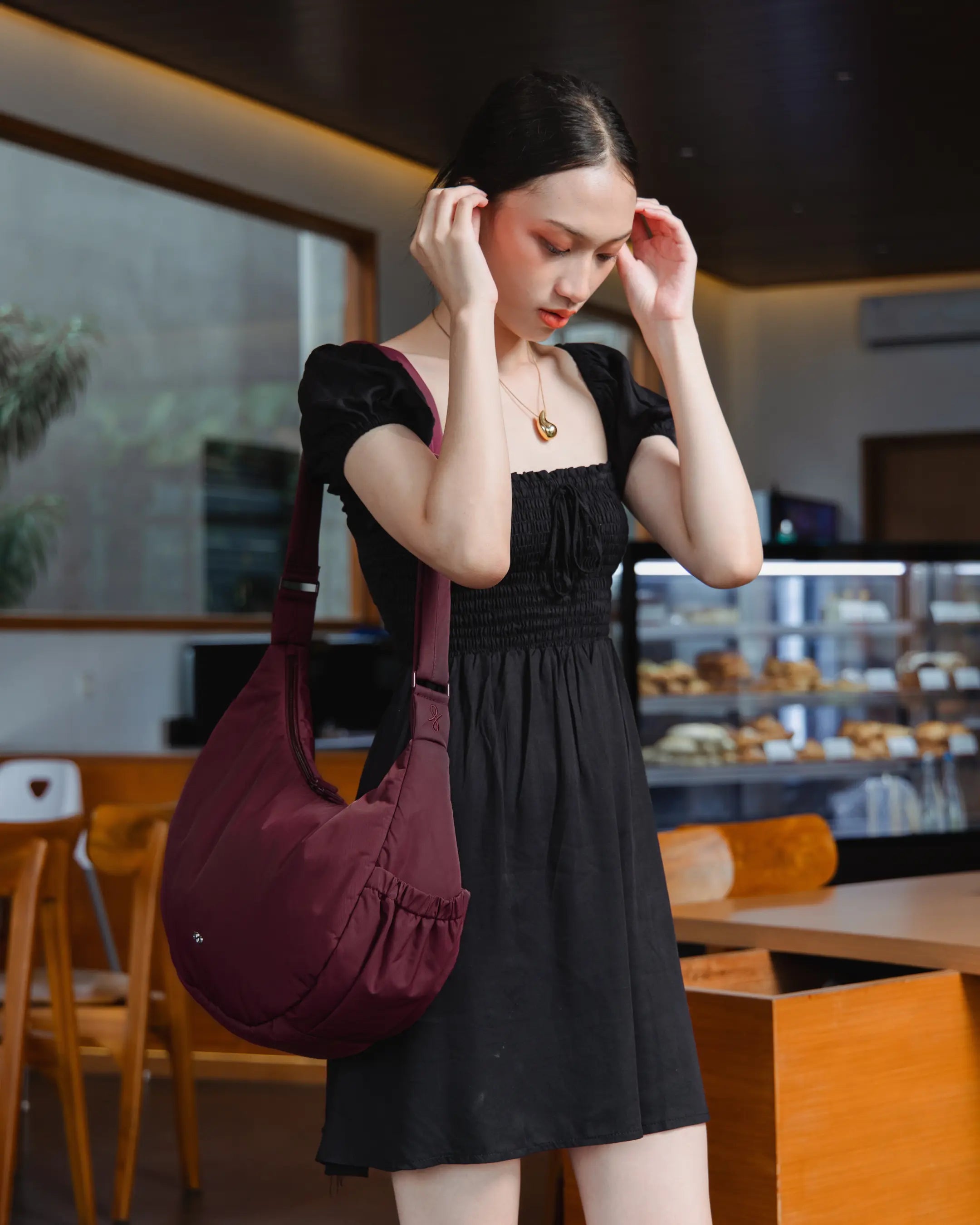 XL POSH CRESCENT BAG IN WINE TSL Singapore