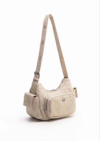 TATE POCKET HANDBAG IN SAND