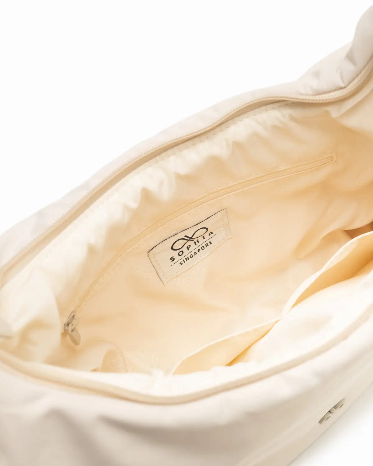 L COSY LUXE CRESCENT BAG IN OAT The Sophia Label