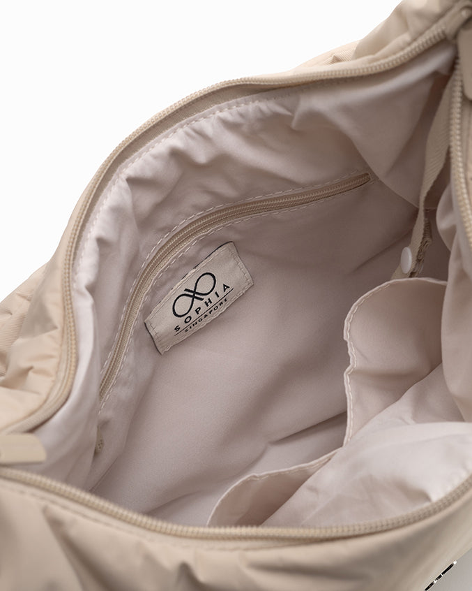 L POSH CRESCENT BAG IN OAT