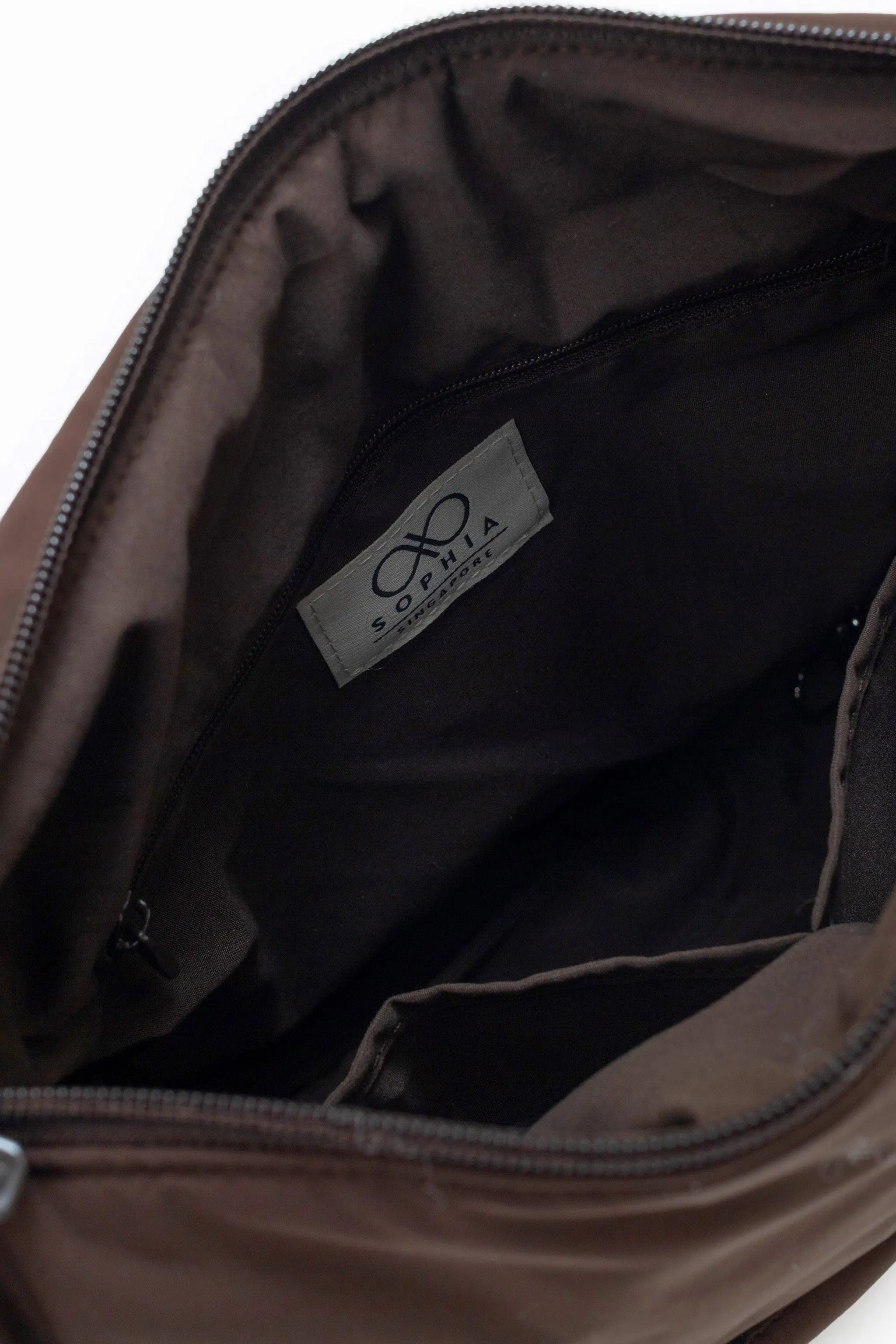 SIGNATURE POCKET CROSSBODY BAG 2.0 IN COSY CACAO 