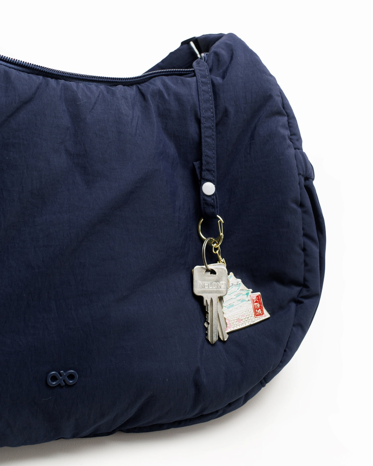 XL COSY PUFFY CROSSBODY BAG IN MIDNIGHT